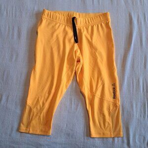 Reebok womens size Medium cropped Play Ice yellow leggings